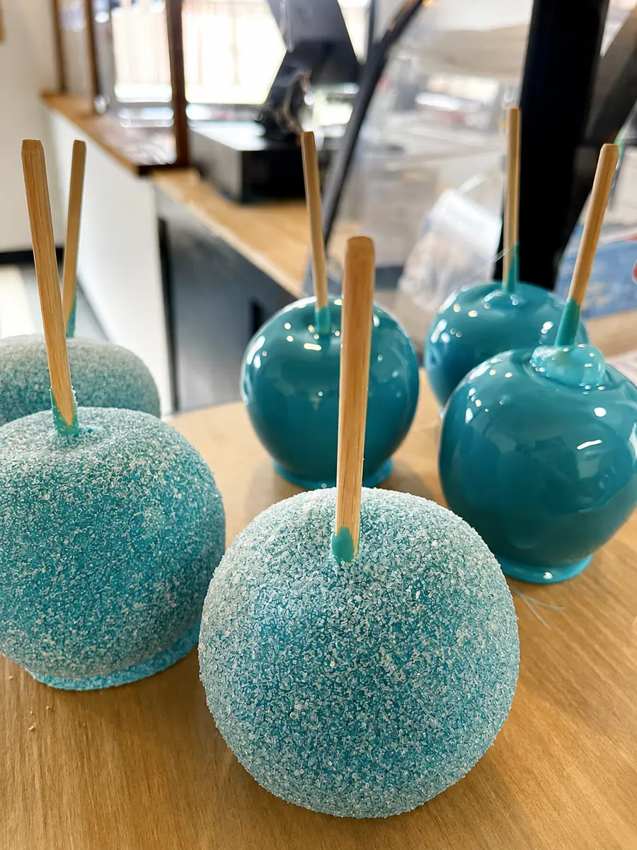 Blue gourmet caramel apples
